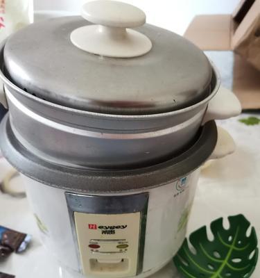 电饭煲糊底的原因及解决方法（探究电饭煲糊底现象背后的因素及解决之道）  第2张