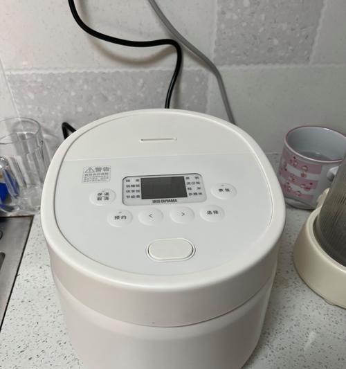 电饭煲出现E4故障的处理方法（解决电饭煲E4故障的有效技巧）  第3张